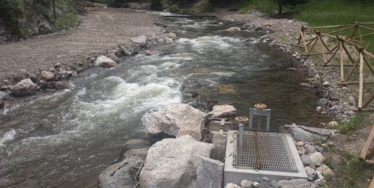 Low head boulder structures for fish-friendly irrigation diversions
